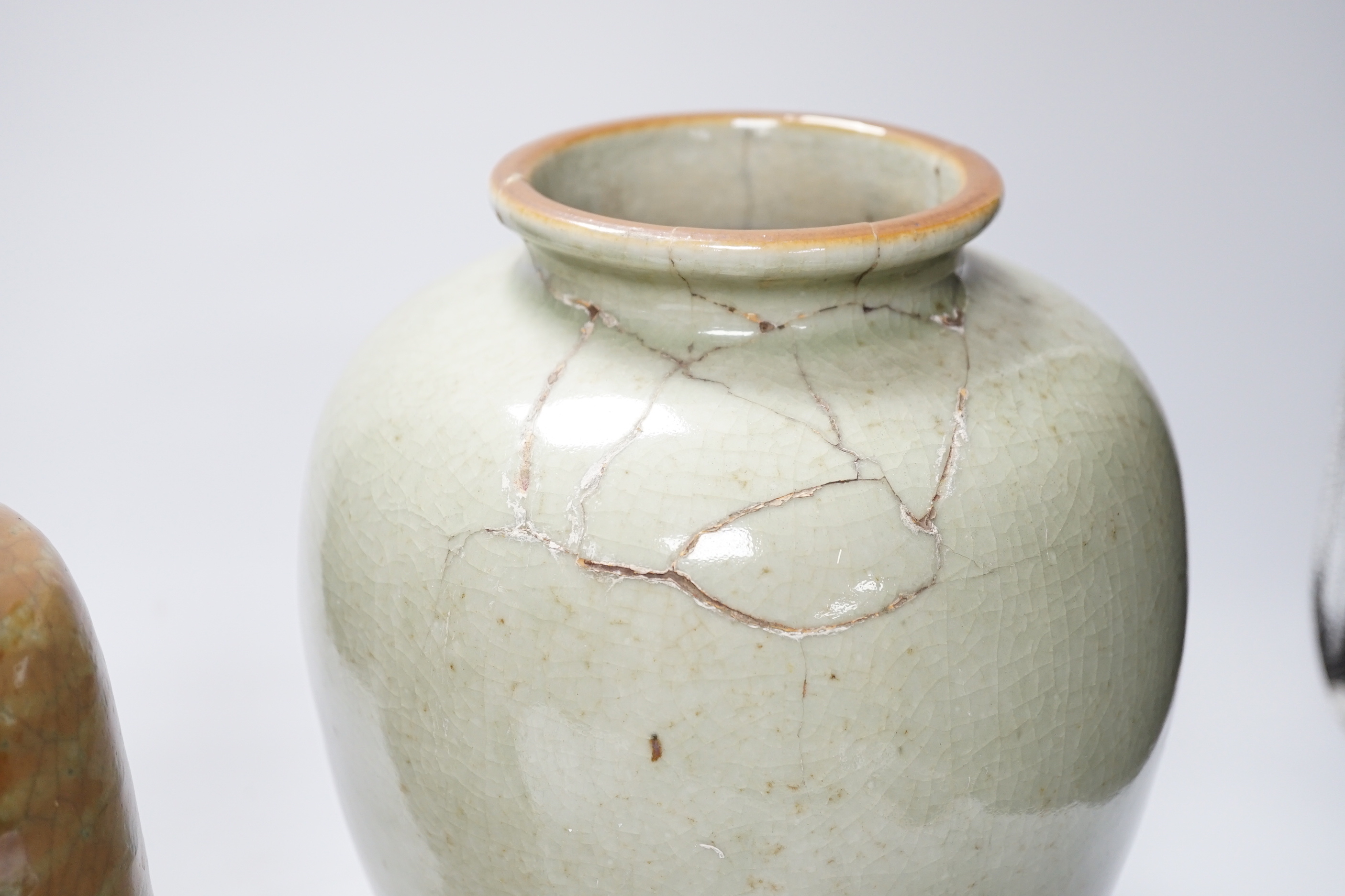 A 19th century Chinese crackle glaze vase on stand and a cafe-au-lait glazed vase, Chinese vase and stand 29cm high (2)
